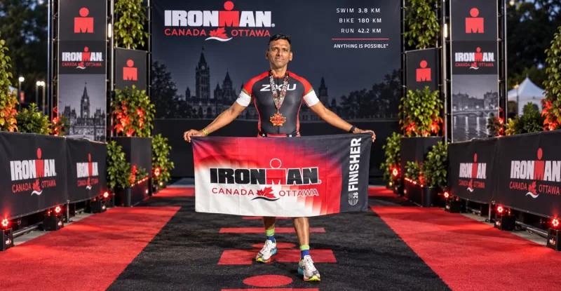 Divine Care physiotherapist completing an IRONMAN triathlon